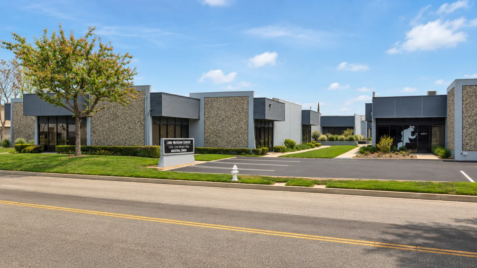 Industrial property with landscaped grounds and clear vehicle access